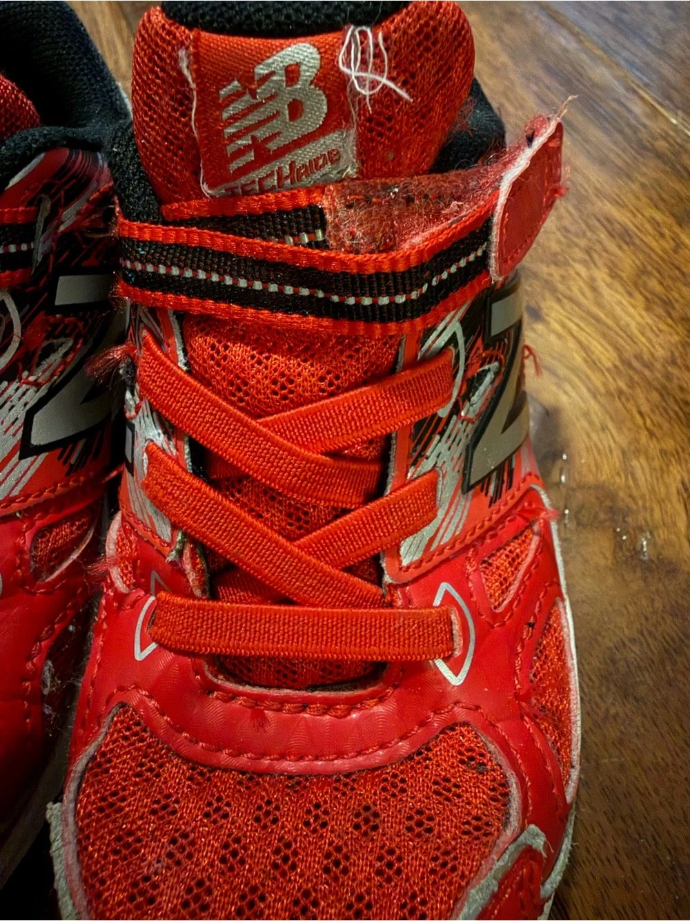 New Balance Kids Red and Black Velcro Lace Sneakers
